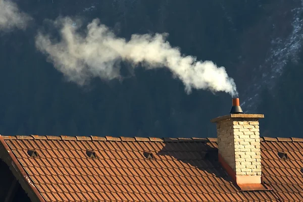 stock image Roof and smoke