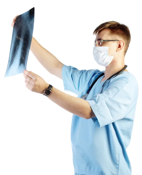 Doctor looking to x-ray image — Stock Photo, Image