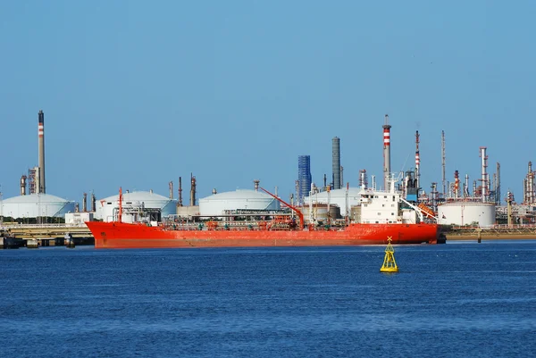 stock image Factory big refinery and carrier ship