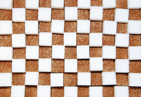 stock image White and brown cubes of sugar