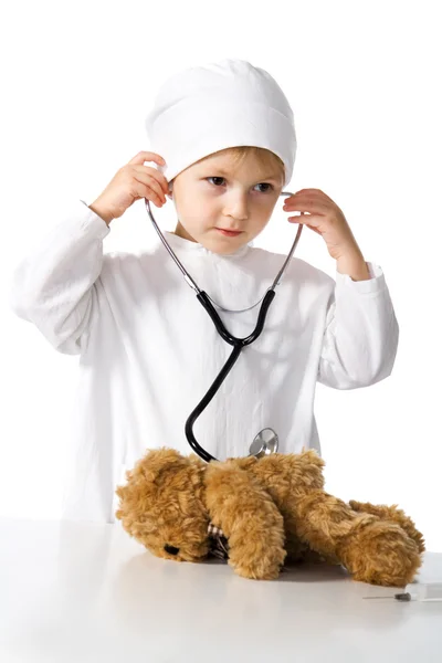 Malý lékař a teddy — Stock fotografie