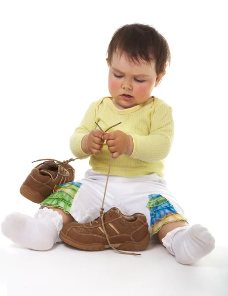 Bebé con botas grandes —  Fotos de Stock