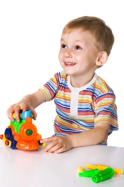 Criança com carro de brinquedo — Fotografia de Stock