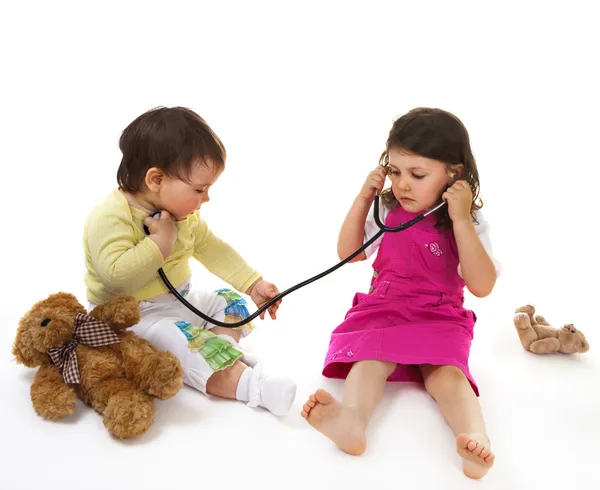 Little doctor and patient Royalty Free Stock Images