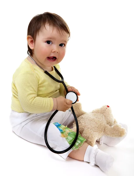 Little playing doctor Stock Image