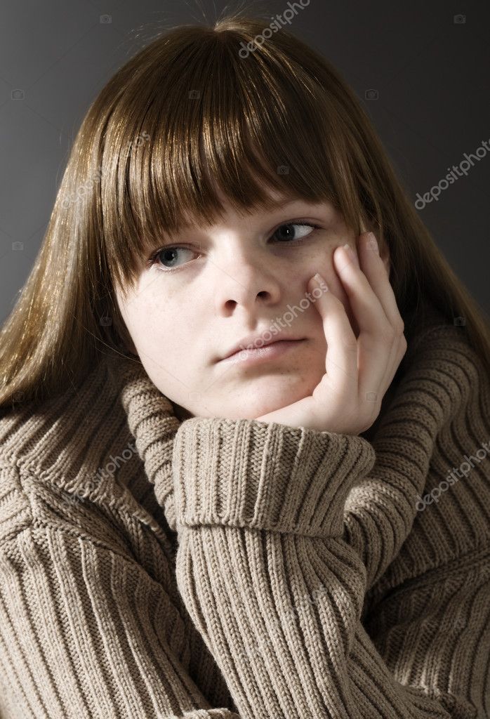Sadness Expressions: Serious Young Girl - Stock Picture 