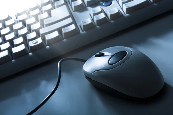 Mouse and keyboard blue toned — Stock Photo, Image