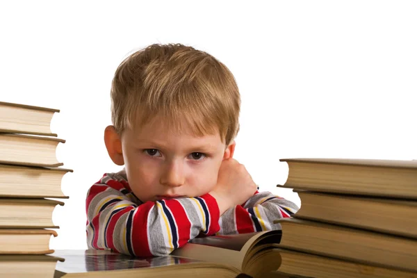 Niño cansado con libros — Foto de Stock