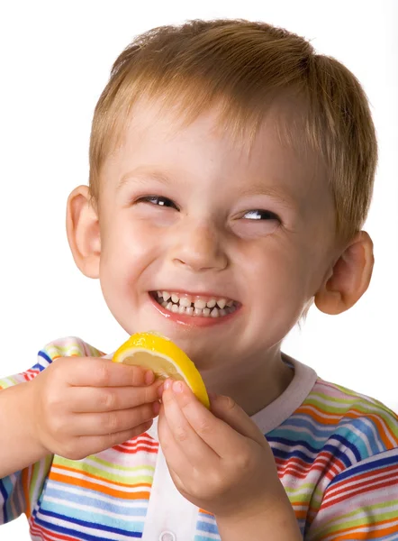Дитина з лимоном — стокове фото