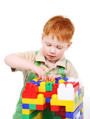 Kid with toy blocks clipart