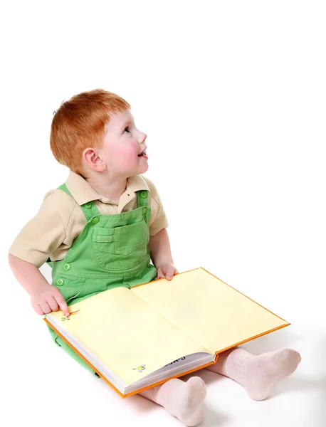Criança feliz com livro — Fotografia de Stock