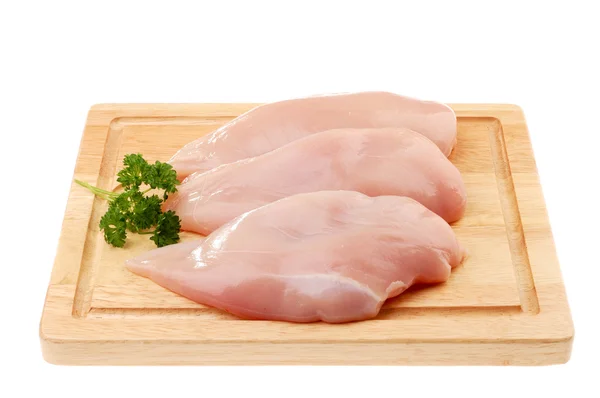 Świeże surowe piersi z kurczaka na białym tle na wh — Zdjęcie stockowe