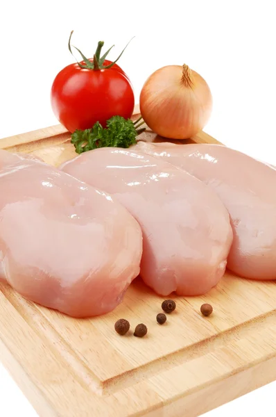 Färsk rå kyckling bröst isolerad på wh Royaltyfria Stockfoton