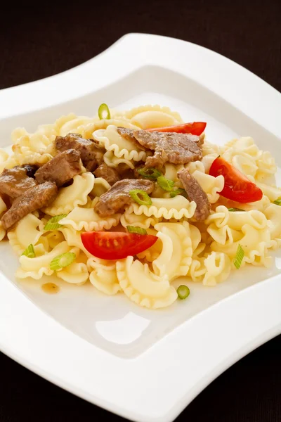 Pasta with meat and vegetables — Stock Photo, Image