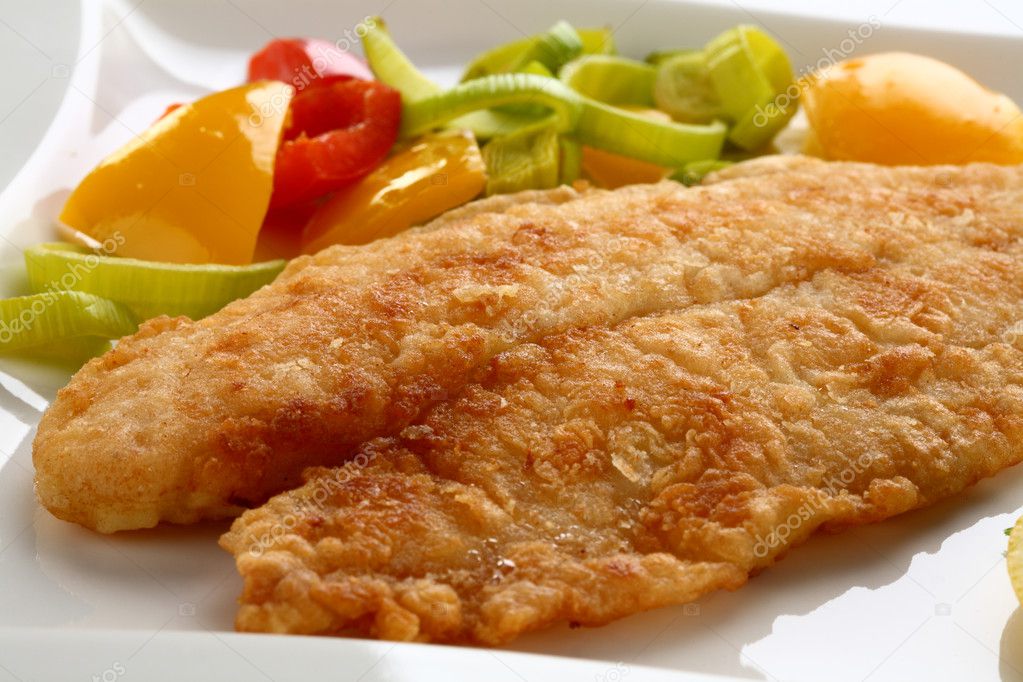 Fried fish fillet with vegetables Stock Photo by ©gbh007 2502227