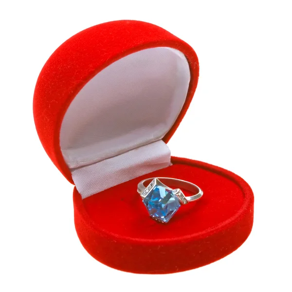 Silver ring with topaz in red box — Stock Photo, Image