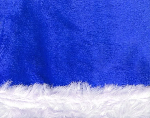 Nahaufnahme blauer Weihnachtsmann Hut Textur — Stockfoto