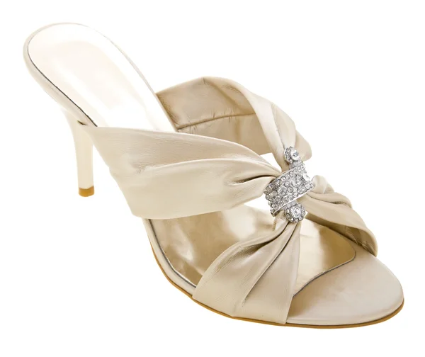 Chaussures femmes dorées sur blanc — Photo