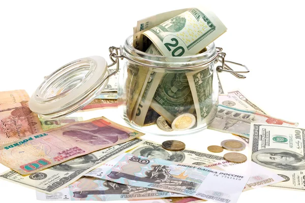 Verschillende geld in de glazen pot — Stockfoto