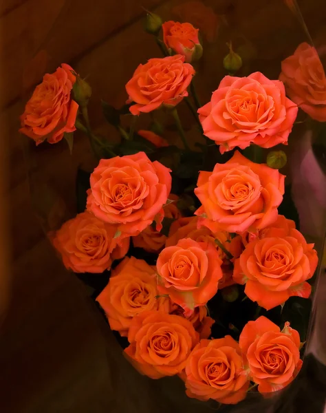 Csokor vörös rózsa, a háttér — Stock Fotó