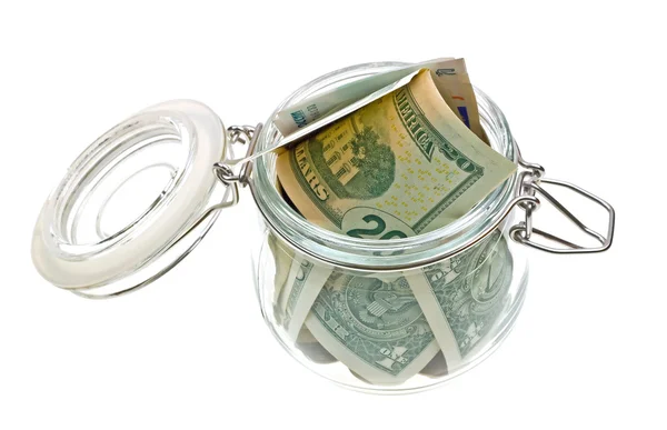 Money in the glass jar on white — Stock Photo, Image