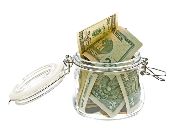 Stock image Different money in the glass jar