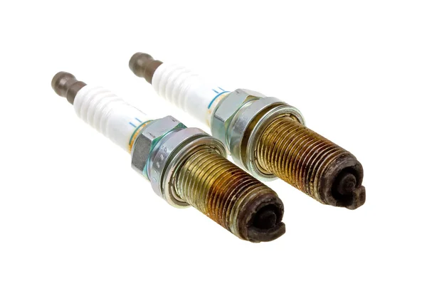 Close-up two old burned spark plugs — Stock Photo, Image