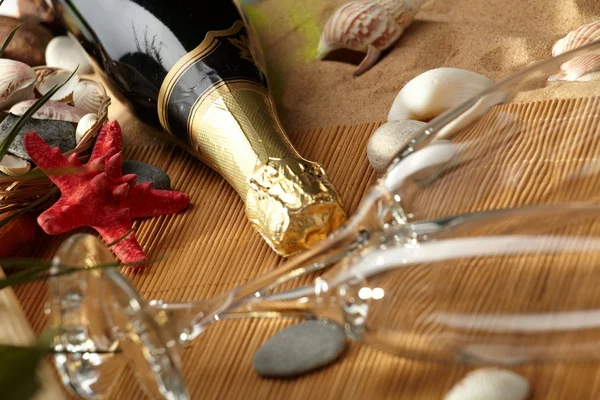 stock image Champagne sparkling on a beach