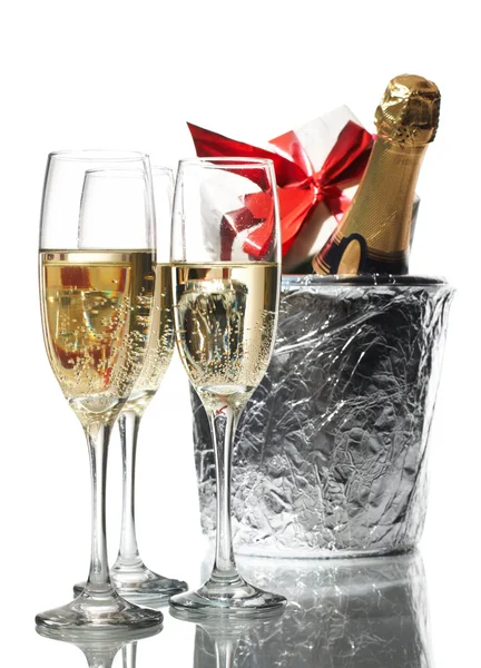 Champagne flutes and ice bucket — Stock Photo, Image
