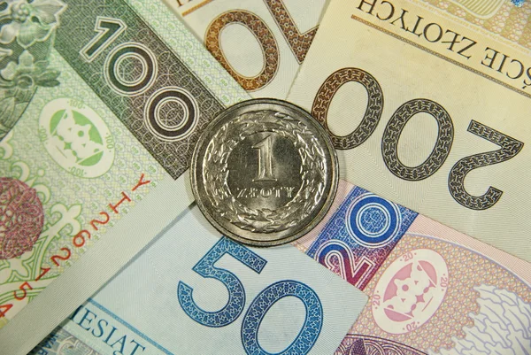 Um zloty em todo o dinheiro polonês — Fotografia de Stock
