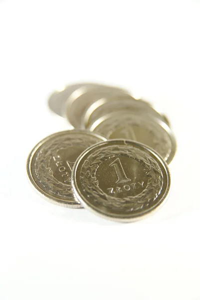 Kevés lengyel egy zloty érmék, fehér — Stock Fotó