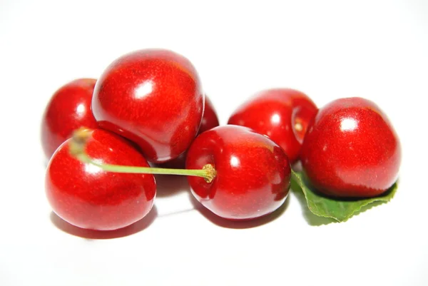 Frutos de cereja doce isolados em branco Imagem De Stock