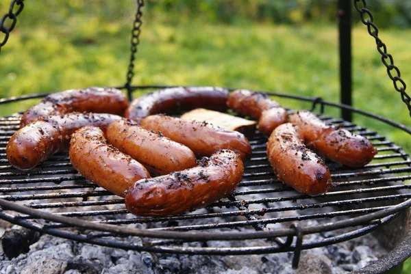 Sausage on grill — Stock Photo, Image