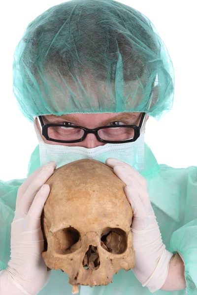 Surgeon with skull — Stock Photo, Image