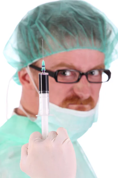 Хирург с инъекцией — стоковое фото