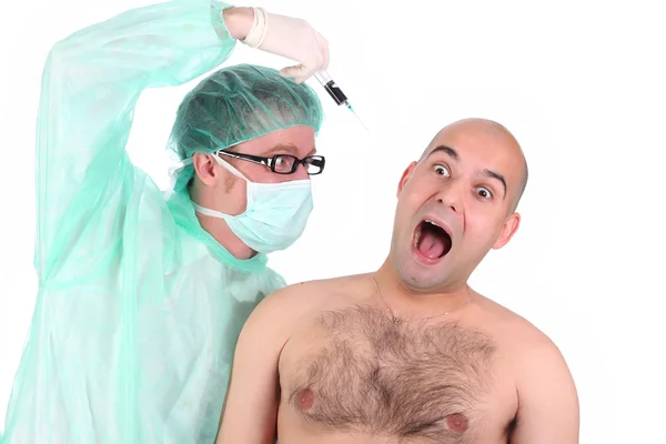 Chirurgien injectant un patient effrayant — Photo