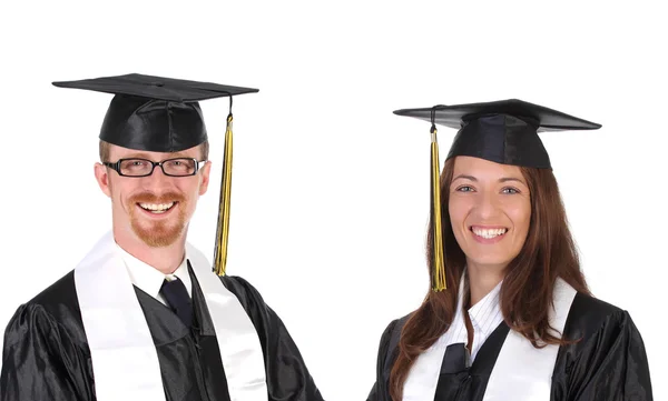 Студенты в выпускных платьях — стоковое фото