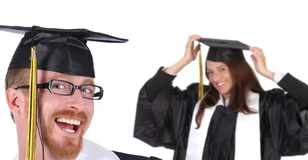Students in graduation gowns — Stock Photo, Image