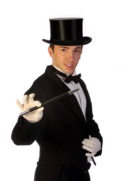 Young magician performing with wand Stock Image
