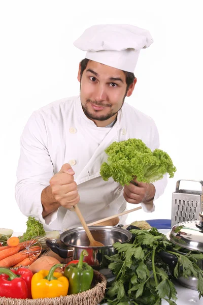 Jonge chef-kok voorbereiding lunch — Stockfoto