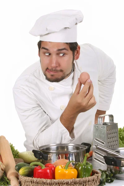 Junge lustige Koch und Ei — Stockfoto