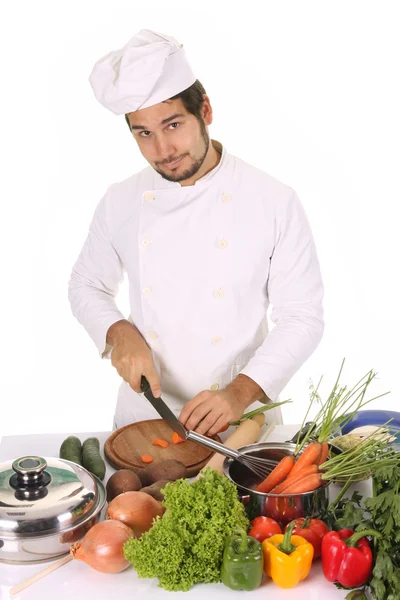 Young chef preparing lunch — Stock Photo, Image
