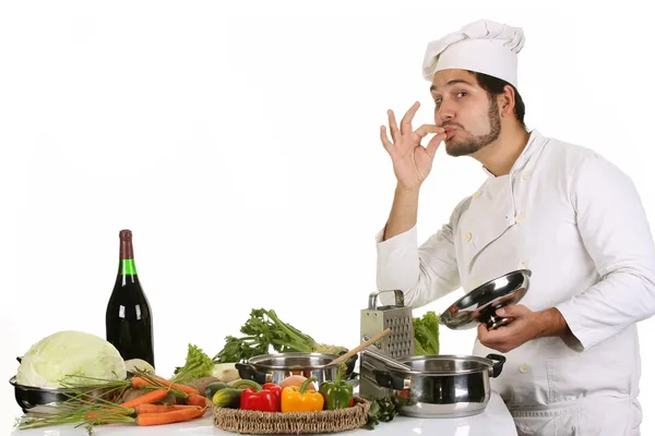 Young chef preparing lunch — Stock Photo, Image