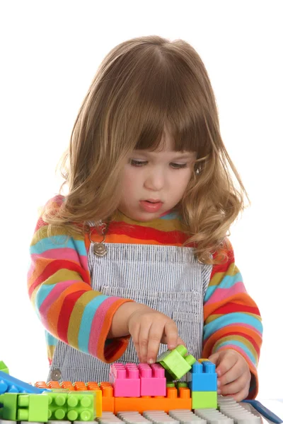 Girl playing building toy blocks — Stock Photo, Image