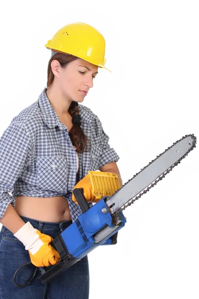 Beauty woman with chainsaw — Stock Photo, Image