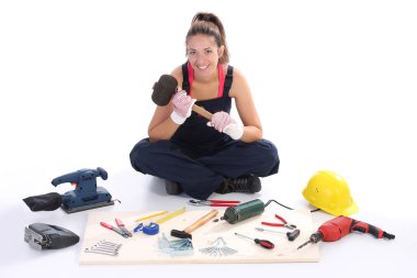 Woman carpenter with work tools clipart