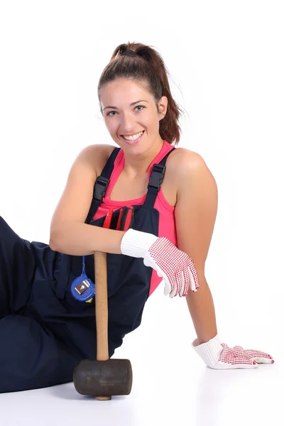Woman with black rubber mallet — Stock Photo, Image