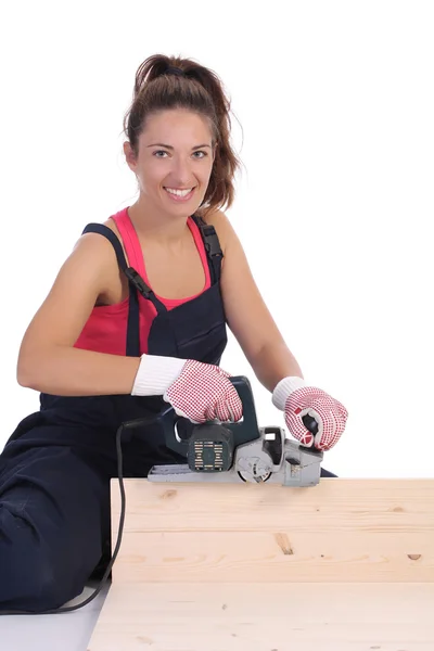 Kadın marangoz iş başında. — Stok fotoğraf