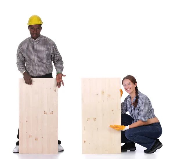 Плотник и женщина-плотник — стоковое фото