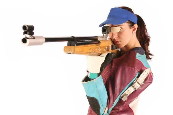 Donna che punta un fucile pneumatico ad aria compressa — Foto Stock